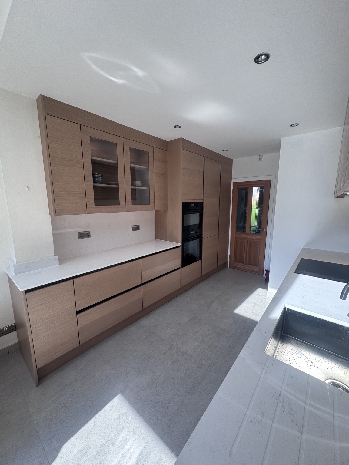 Tavola · Parched Oak kitchen by NI Kitchen Works